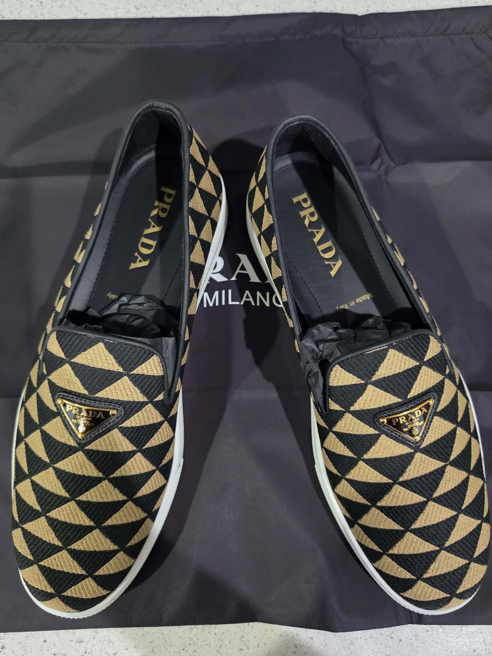 Prada Black and Tan Geometric Slip-On Loafers